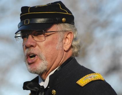 The Colonal giving a short speech to attendees.Photo by PJ Star-Ron Johnson